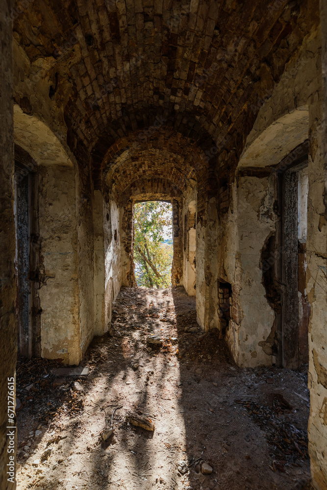 Fototapeta premium Vaulted corridor of old abandoned prison