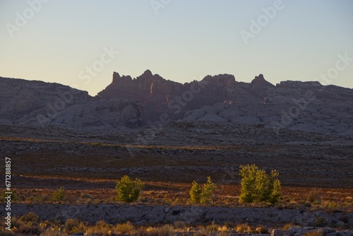 Interstate 70 winds through the San Rafael Swell, a high desert region of unique landforms like mesas and buttes and pastures on top