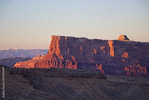 Interstate 70 winds through the San Rafael Swell, a high desert region of unique landforms like mesas and buttes and pastures on top