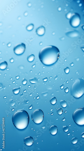 A close up of water droplets on a blue surface