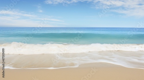the ocean and sand on a sunny day