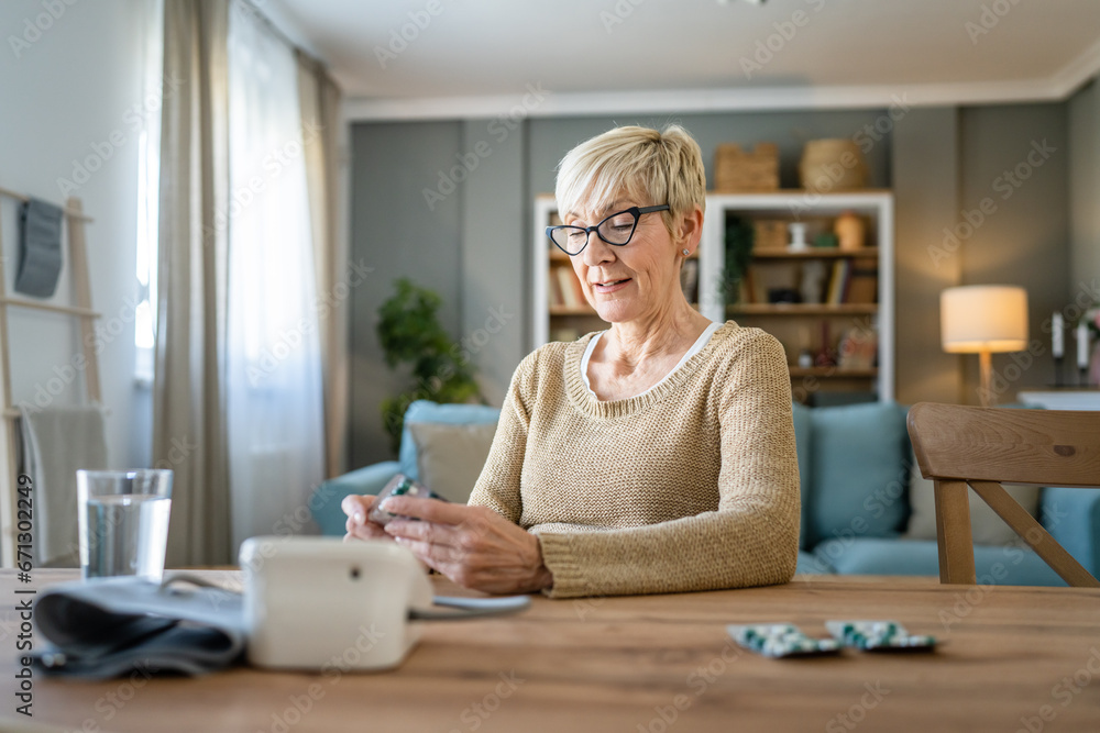 One senior caucasian woman take medicine drugs or supplement vitamin One senior caucasian woman take medicine drugs or supplement vitamin