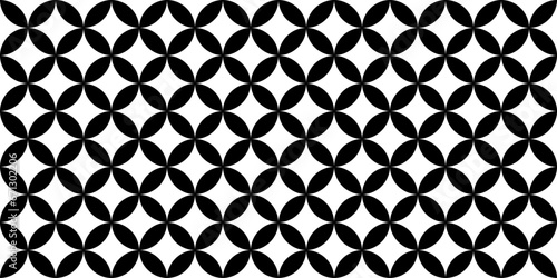 Simple geometric seamless pattern with black petals and white rhombus, vector