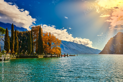 Panoramic view of the beautiful Lake Garda .Riva del Garda town and Garda lake in the autumn time , Trentino Alto Adige region,Italy