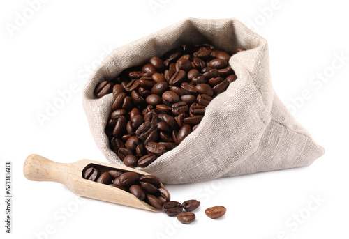 Bag and wooden scoop with roasted coffee beans isolated on white