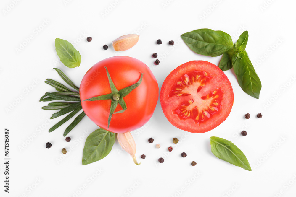 Flat lay composition with whole and cut tomatoes on white background Flat lay composition with whole and cut tomatoes on white background