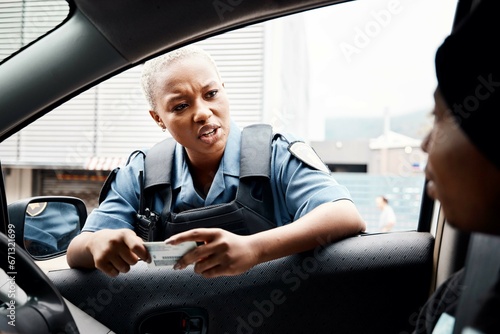 Talking, drivers license or police officer in city to check info for law enforcement, protection or street safety. Black woman, traffic stop or cop on security patrol for road block or crime justice