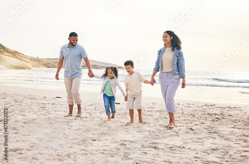 Beach, holiday and happy family holding hands, walking and bond in nature together. Love, children and parents at the sea for travel, freedom and adventure at the ocean, relax and having fun on trip