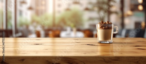 Coffee cup on the wooden table in coffee shop