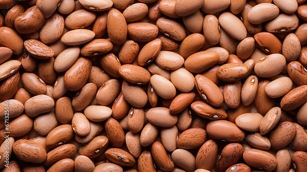 Top view full frame of whole ripe alavese pinto beans placed together as background. Top view full frame of whole ripe alavese pinto beans placed together as background.