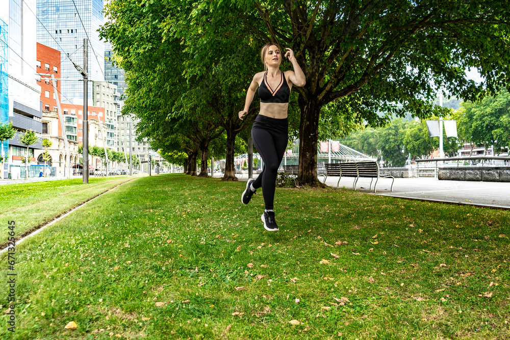 Fototapeta premium Urban-Nature Fusion: Running at the Crossroads of City and Wilderness