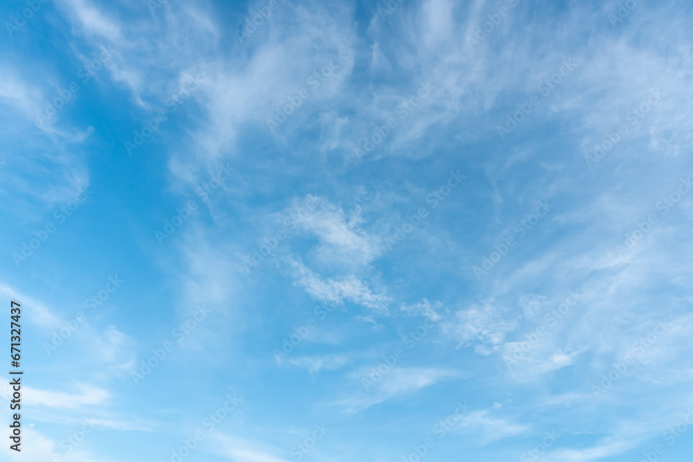 Beautiful blue sky with strange shape of clouds in the morning or evening used as natural background texture in decorative art work. Beautiful blue sky with strange shape of clouds in the morning or evening used as natural background texture in decorative art work.