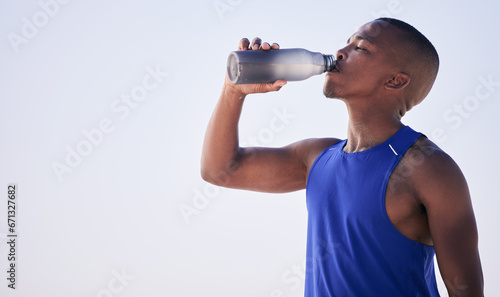 Fitness, black man and drinking water outdoor for training, running and morning cardio on mockup space. Exercise, break and African male person and runner with drink for hydration, health and workout