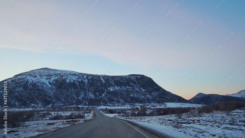 A road with snow mountain background. A road with snow mountain background.