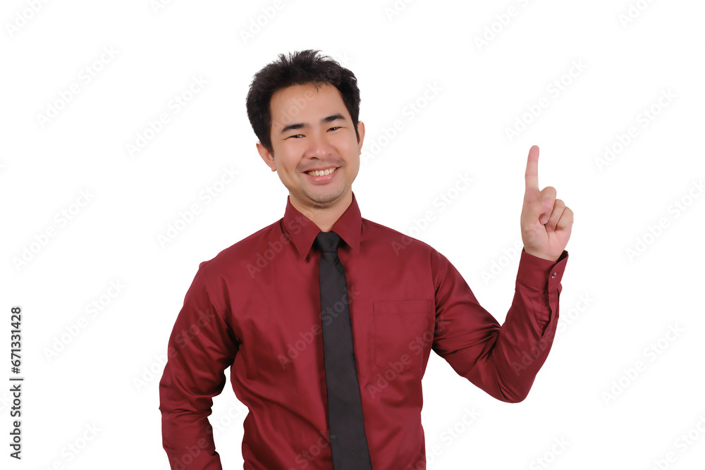Asian male businessman pointing his finger at empty space, smiling face Asian male businessman pointing his finger at empty space, smiling face