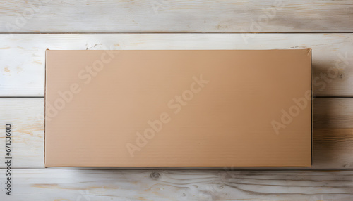 Blank enlongated cardboard parcel box on a light wooden surface. Top down view. Generative AI. photo