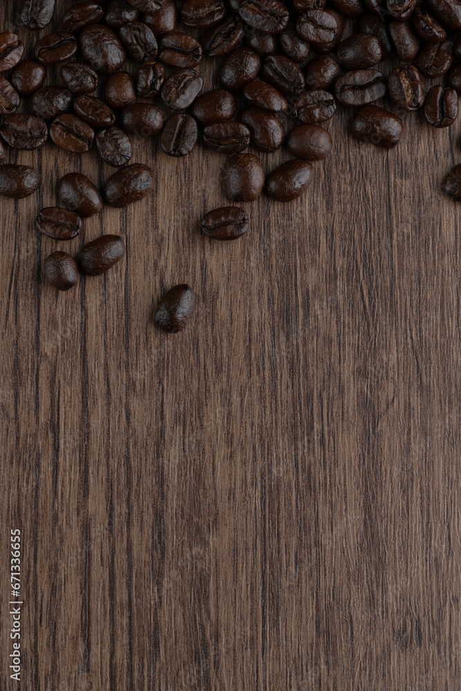 Fototapeta premium Roasted coffee bean on wooden table..