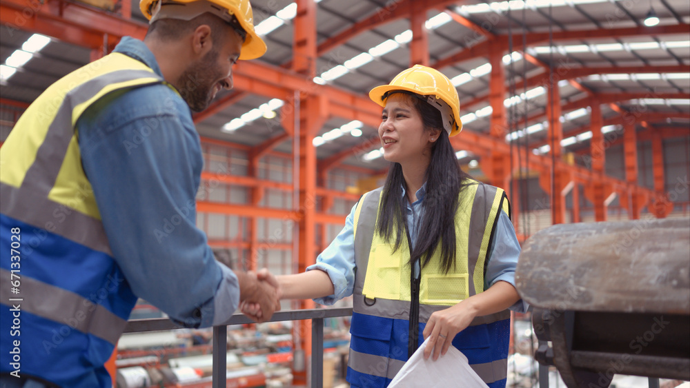 A team of engineers and architects are jointly inspecting factory at the site. It is a massive new facility for making metal sheets as well as a transportation and distribution warehouse. A team of engineers and architects are jointly inspecting factory at the site. It is a massive new facility for making metal sheets as well as a transportation and distribution warehouse.