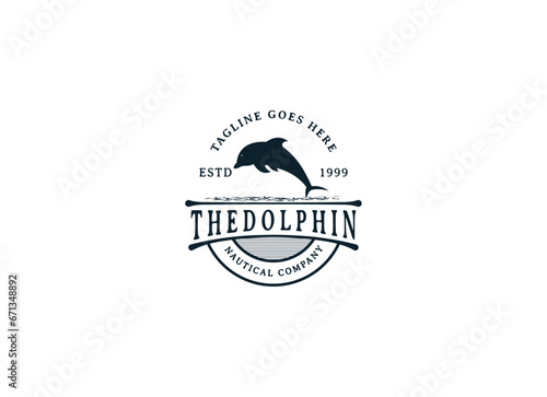 Vintage retro hipster dolphin logo design. 
