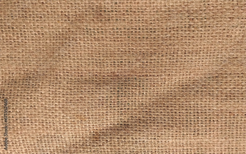 Rural texture of sackcloth. Background of very coarse, rough fabric woven made of flax, jute or hemp. Burlap bag material. Design element. Sacking and bagging pattern. Top view.