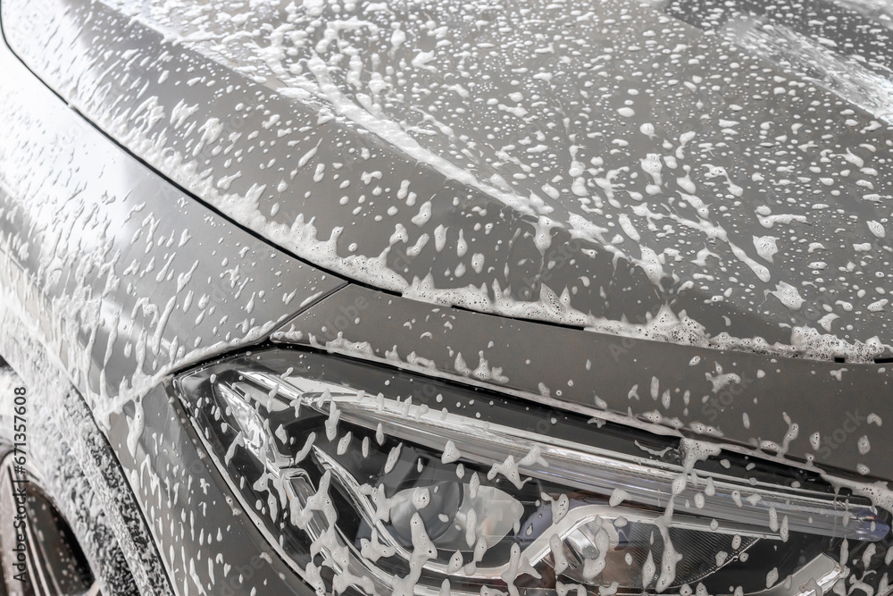 Obraz premium car cleaning and washing with foam soap