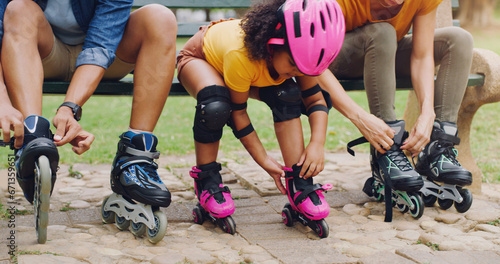 Canvas-taulu Family, children or rollerblade with a girl and parents in the park together for fun or recreation