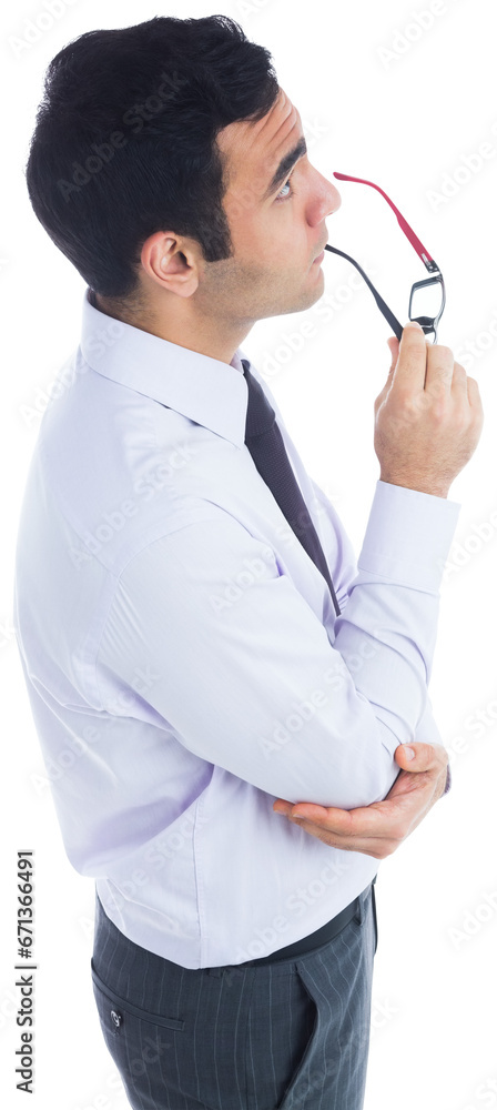 Digital png photo of focused asian businessman holding glasses, looking up on transparent background
