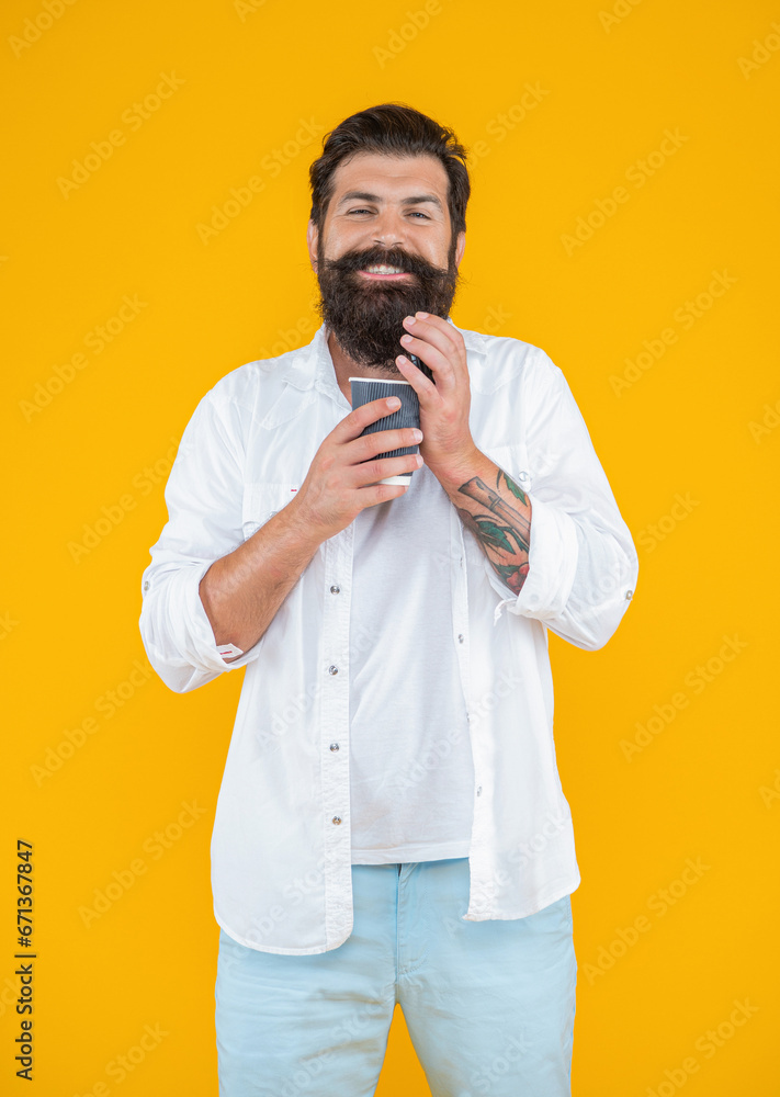man smelling coffee at break on background. photo of man has coffee break. man smelling coffee at break on background. photo of man has coffee break.