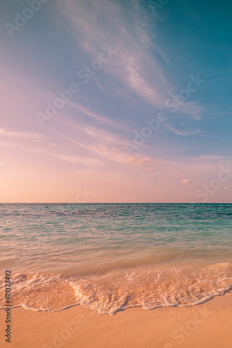 Best vertical beach coast panorama. Sunset landscape, calm sea waves relaxing sky clouds. Inspire meditation wallpaper. Majestic nature captivating serene gold sands tranquil. Picturesque paradise