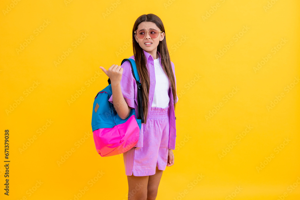 education and knowledge for girl. teen school girl with backpack ready to study. school education and childhood. teen girl school education. back to school. teen childhood. point finger education and knowledge for girl. teen school girl with backpack ready to study. school education and childhood. teen girl school education. back to school. teen childhood. point finger
