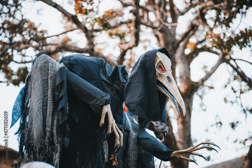 scary skeleton in a black cape