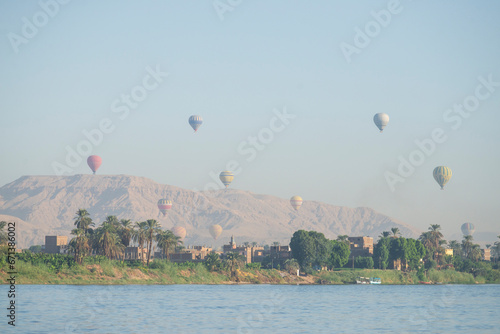 Landscape view across nile river to luxor west bank photo