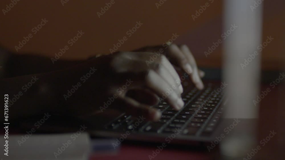 person typing on a keyboard person typing on a keyboard
