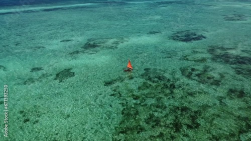 KIZIMKAZI ZANZIBAR BOAT SAIL OCEANIC BLUE ISLAND BY DRONE photo