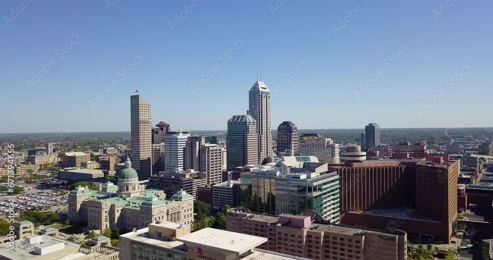 Aerial orbiting shot of the large skyscrapers in downtown Indianapolis Aerial orbiting shot of the large skyscrapers in downtown Indianapolis
