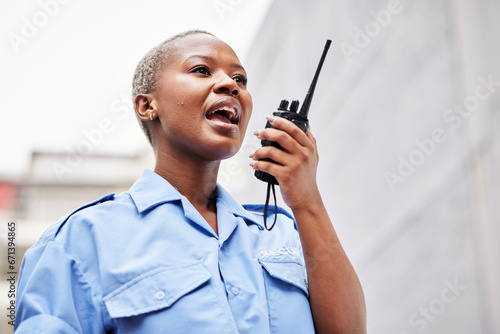 Walkie talkie, woman and security guard with radio outdoor for safety, justice and call backup. Black female police officer, bodyguard and contact audio communication for crime watch and surveillance