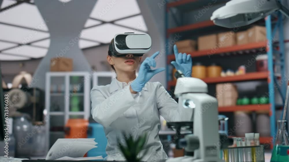 Goggles scientist working virtual reality technology in laboratory close up. Goggles scientist working virtual reality technology in laboratory close up.