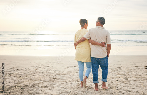 Senior couple hug, back and beach, ocean and travel with bonding and love, trust and marriage outdoor. Adventure, tropical holiday and waves, man and woman with loyalty and life partner in nature