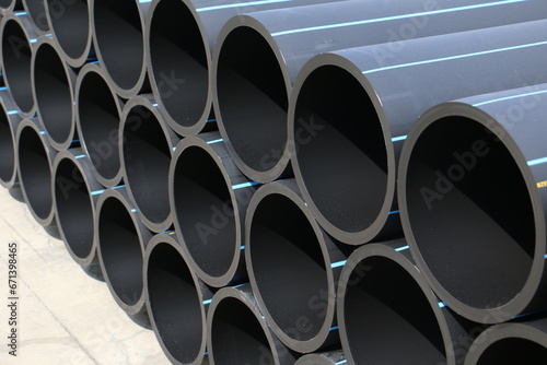 PE pipe plant, Industrial PE pipeline for gas and water. HDPE pipe, Polyethylene PE100 pipe. Polyethylene pipe plant photo