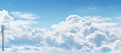 Fototapeta Naklejka Na Ścianę i Meble -  White fluffy clouds against a blue sky