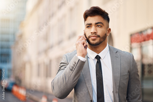 Phone call, serious and professional businessman in the city in a company consultation or conversation. Technology, networking and male lawyer talking on cellphone for communication in an urban town.