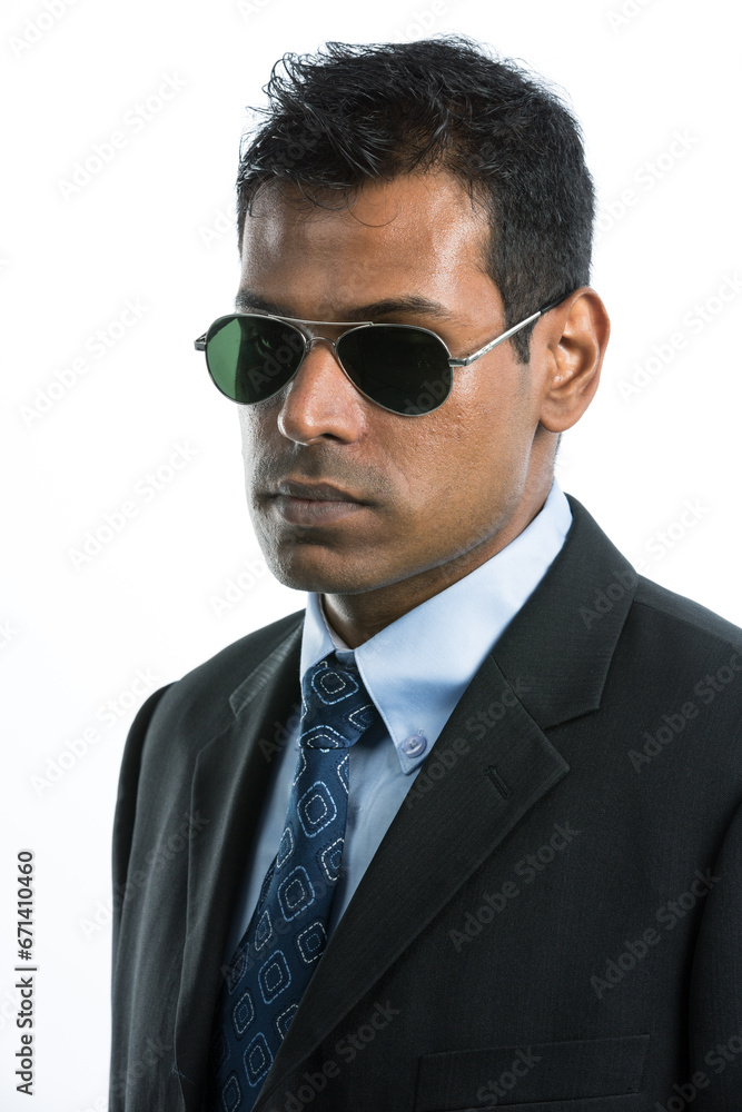 Indian business man wearing sunglasses. Indian business man wearing sunglasses.