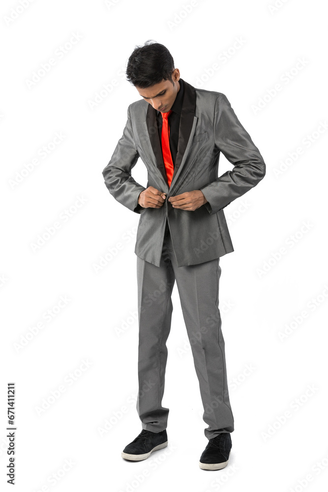 Indian man buttoning up his suit. Indian man buttoning up his suit.