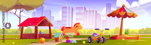 Sunny playground for kids in city park. Vector cartoon illustration of green public garden with rocking horse, wooden hut, sandbox under parasol, toys on ground, tricycle, modern cityscape on horizon