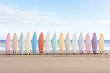 Row of pastel multicolored surfboards on the beach