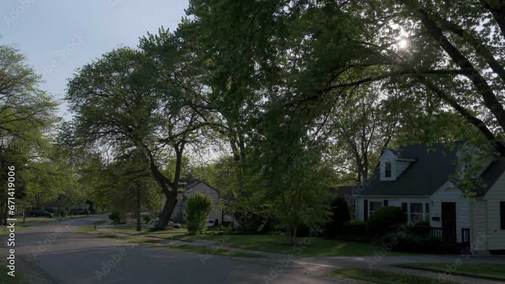 A street in the suburbs, traditional American residential houses A street in the suburbs, traditional American residential houses