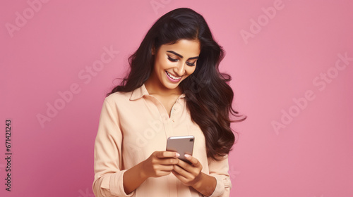 young indian woman using smartphone photo