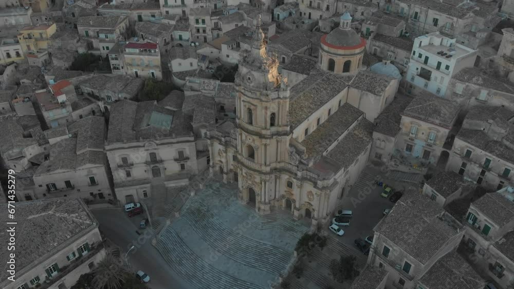 Close up aerial shot of Cathedral of Saint George in historic town of Modica, Italy