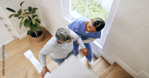 Tableau sur toile Woman, nurse and helping senior up stairs in retirement home for support, trust or healthcare
