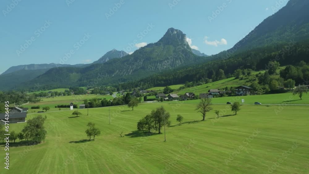 Cinematic drone sweeps left, unveiling Austrian splendor: Wolfgangsee lake and the majestic Bleckwand mountain. Aerial beauty. LuPa Creative Cinematic drone sweeps left, unveiling Austrian splendor: Wolfgangsee lake and the majestic Bleckwand mountain. Aerial beauty. LuPa Creative